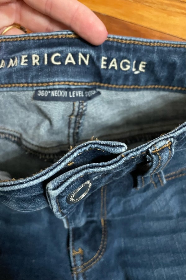 American Eagle Darker Blue Distressed 360 Next Level Stretch Skinny Je –  Stylized Thrift Boutique