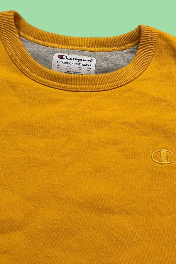 champion crewneck sweatshirt in yellow xl Nuuly Thrift